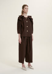 Elegant Ruffle-Collar Linen Blouse With Statement Buttons And Relaxed Tailored Silhouette