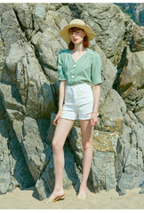 High-Rise Distressed Denim Shorts with Raw Hem for Women