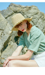 High-Rise Distressed Denim Shorts with Raw Hem for Women