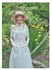 Pleated Cold-Shoulder Linen Dress with Bow Strap and Midi Hemline