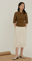 High-Waisted A-Line Linen Skirt With Back Waist Tie And Pleated Front Detail