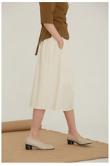 High-Waisted A-Line Linen Skirt With Back Waist Tie And Pleated Front Detail