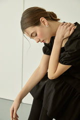 Tiered linen mini dress with square neckline and puff sleeves for effortless elegance