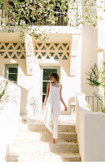 Linen Wide-Leg Jumpsuit with Shoulder Tie Straps and Oversized Patch Pockets