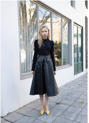 Soft Leather Midi Skirt with Sculpted Pleats and Structured Pockets