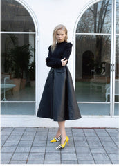 Soft Leather Midi Skirt with Sculpted Pleats and Structured Pockets