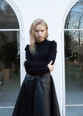 Soft Leather Midi Skirt with Sculpted Pleats and Structured Pockets