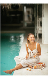 Linen Tie-Front Jumpsuit with Wide-Leg Cut and Adjustable Shoulder Straps