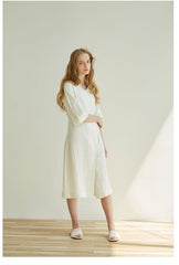 Elegant Button-Front V-Neck Linen Dress with Half Sleeves and Tailored Waist Detail