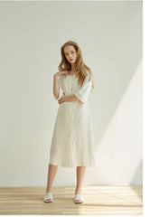 Elegant Button-Front V-Neck Linen Dress with Half Sleeves and Tailored Waist Detail