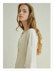Elegant Button-Front V-Neck Linen Dress with Half Sleeves and Tailored Waist Detail