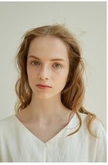 Elegant Button-Front V-Neck Linen Dress with Half Sleeves and Tailored Waist Detail