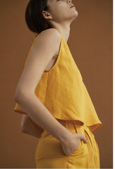 Sleeveless Linen Top With V-Neckline And Flowy Cropped Hem