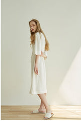 Elegant Button-Front V-Neck Linen Dress with Half Sleeves and Tailored Waist Detail