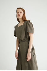 High-Waisted Linen Midi Skirt with Front Pleat and Back Elastic Detail for Elegant Movement