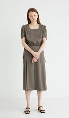 High-Waisted Linen Midi Skirt with Front Pleat and Back Elastic Detail for Elegant Movement