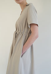 Linen Midi Dress with V-Neckline, Gathered Waist Detail, and Short Relaxed Sleeves