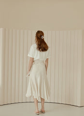 Flared Hem Linen Midi Skirt with Side Tie Detail and High Waist Silhouette