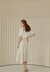 Flared Hem Linen Midi Skirt with Side Tie Detail and High Waist Silhouette