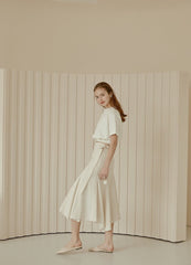 Flared Hem Linen Midi Skirt with Side Tie Detail and High Waist Silhouette