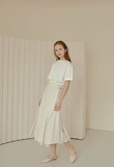 Flared Hem Linen Midi Skirt with Side Tie Detail and High Waist Silhouette