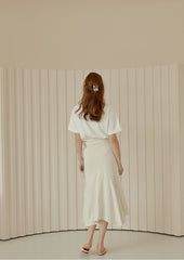 Flared Hem Linen Midi Skirt with Side Tie Detail and High Waist Silhouette