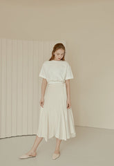 Flared Hem Linen Midi Skirt with Side Tie Detail and High Waist Silhouette