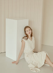 Flared Hem Linen Midi Skirt with Side Tie Detail and High Waist Silhouette