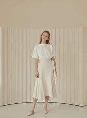 Flared Hem Linen Midi Skirt with Side Tie Detail and High Waist Silhouette