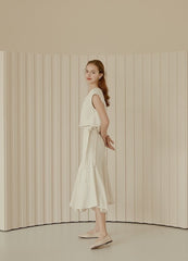 Flowy Linen Midi Skirt with Flared Hem and Side Tie Detail for Effortless Elegant Styling