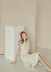 Flowy Linen Midi Skirt with Flared Hem and Side Tie Detail for Effortless Elegant Styling