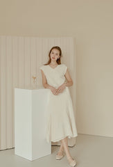 Flowy Linen Midi Skirt with Flared Hem and Side Tie Detail for Effortless Elegant Styling