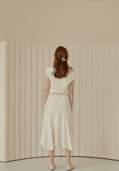 Flowy Linen Midi Skirt with Flared Hem and Side Tie Detail for Effortless Elegant Styling