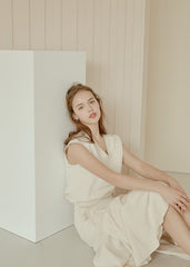 Flowy Linen Midi Skirt with Flared Hem and Side Tie Detail for Effortless Elegant Styling