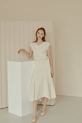 Flowy Linen Midi Skirt with Flared Hem and Side Tie Detail for Effortless Elegant Styling