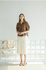 High-Waisted Linen Midi Skirt with Front Pockets and Belt Detail – Tailored Minimalist Style
