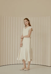 Flowy Linen Midi Skirt with Flared Hem and Side Tie Detail for Effortless Elegant Styling