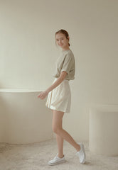 High-Waisted Pleated Mini Skirt in Lightweight Linen Blend with Side Zipper Closure