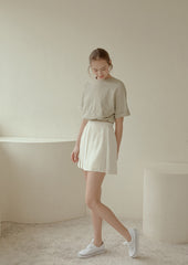 High-Waisted Pleated Mini Skirt in Lightweight Linen Blend with Side Zipper Closure