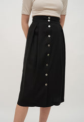 High-Waisted A-Line Linen Midi Skirt with Front Button Detail and Soft Pleat Accents