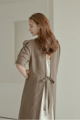 Elegant Puff Sleeve Midi Linen Dress with Back Tie Detail and Minimalist Silhouette