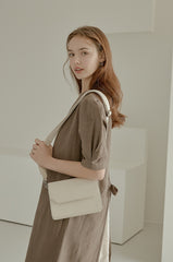 Elegant Puff Sleeve Midi Linen Dress with Back Tie Detail and Minimalist Silhouette