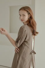 Elegant Puff Sleeve Midi Linen Dress with Back Tie Detail and Minimalist Silhouette