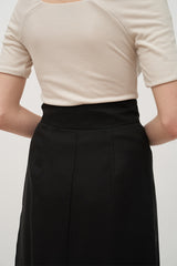 High-Waisted A-Line Linen Midi Skirt with Front Button Detail and Soft Pleat Accents