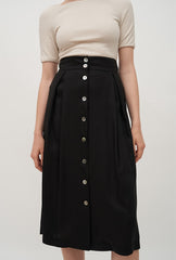 High-Waisted A-Line Linen Midi Skirt with Front Button Detail and Soft Pleat Accents