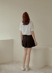 High-Waisted Pleated Linen Mini Skirt With Flared Silhouette and Tailored Waistband Finish