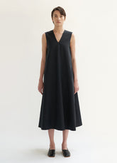 Sleeveless A-Line Linen Dress with V-Neckline and Flowing Mid-Calf Hem