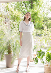 High-Waisted Button-Front Linen Midi Skirt with Soft Drape and Side Slit Detail