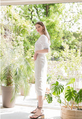 High-Waisted Button-Front Linen Midi Skirt with Soft Drape and Side Slit Detail