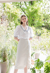 High-Waisted Button-Front Linen Midi Skirt with Soft Drape and Side Slit Detail